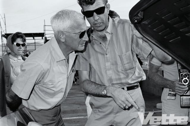 Carroll Shelby gives Zora Arkus-Duntov a peek under the hood of his brutal Ford Cobra
